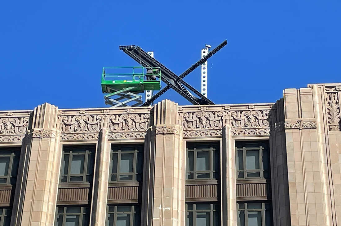 X' logo installed atop Twitter building, spurring San Francisco to  investigate : NPR